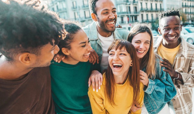 Group of friends hangin out laughing 